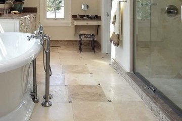 McIntyre Construction LLC traditional marble tiled bathroom renovation
